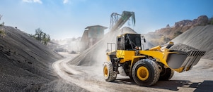 Yellow digger on construction site