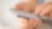 Close-up of hand using smartphone over map