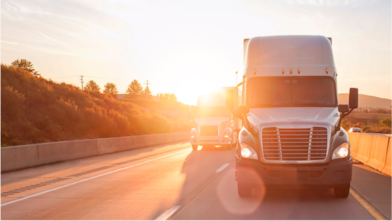 Truck driving in sunlight