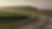 Farmer holding bucket in field