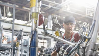 Worker in manufacturing plant