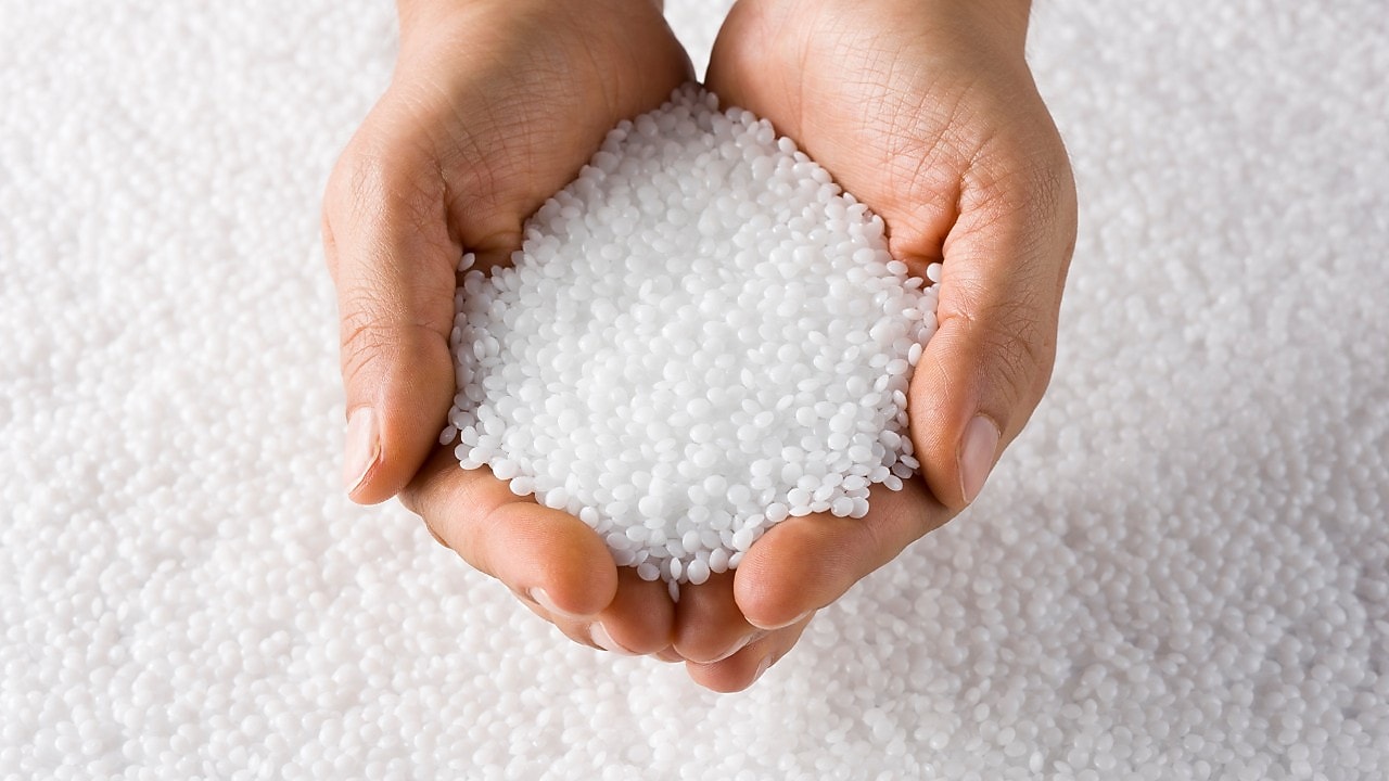 Hands holding plastic