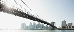 Steel bridge leading to a city