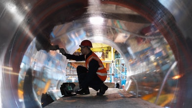 Engineer Testing Forged Steel