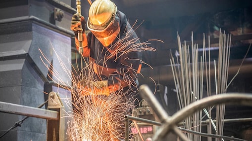 Metals engineer working on production