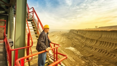 Man looking over mine 