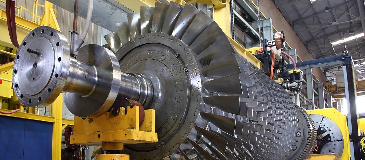 Close up of a turbine with yellow hardware