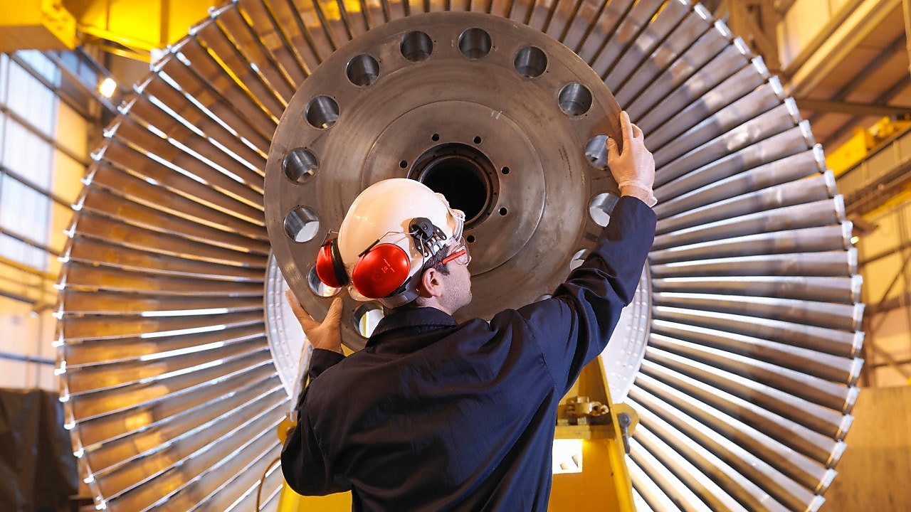 Engineer Inspecting Turbine