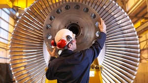 Engineer Inspecting Turbine