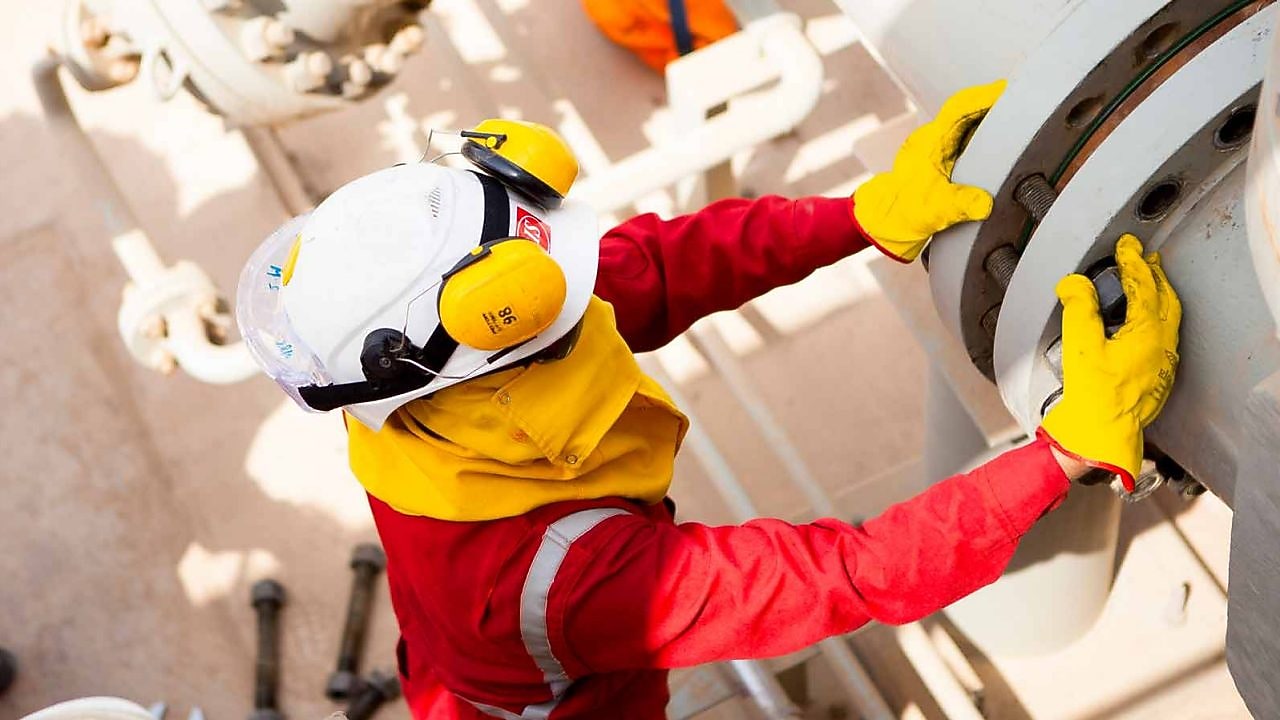 engineer working on big pipeline