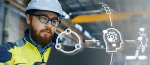 digital overlay on field worker in PPE with laptop