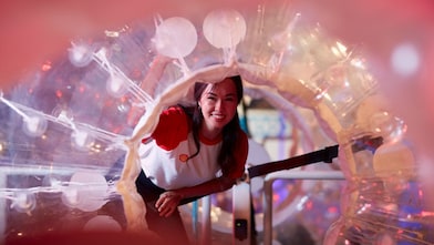 Women through a plastic zorb