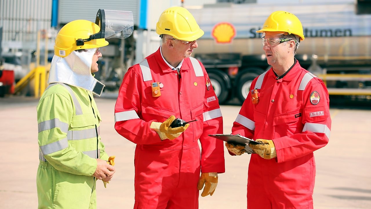 three empployess talking