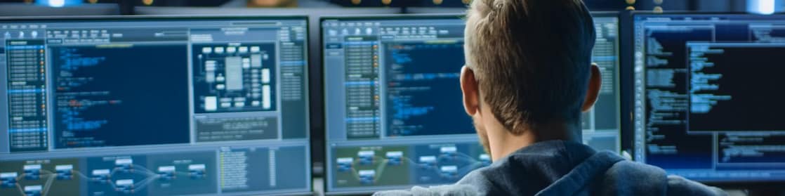 a man looking at computer screen