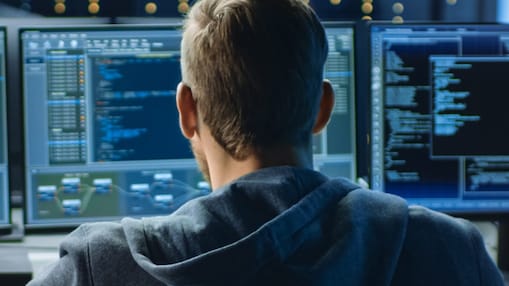 a man looking at computer screen