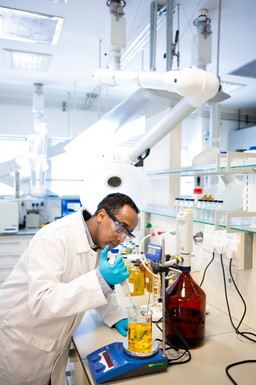 Lab person testing Oil