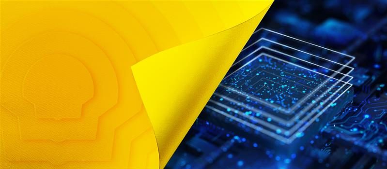 A data chip with a yellow peeling page over the top with the Shell pecten
