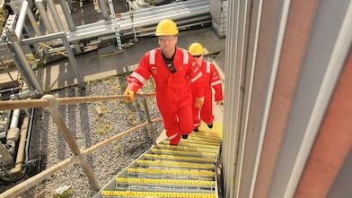 shell worker walking upstairs