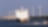 Ferry at sea in front of wind turbines