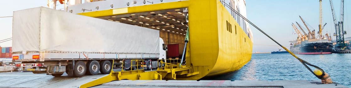 cargo ship transporting truck