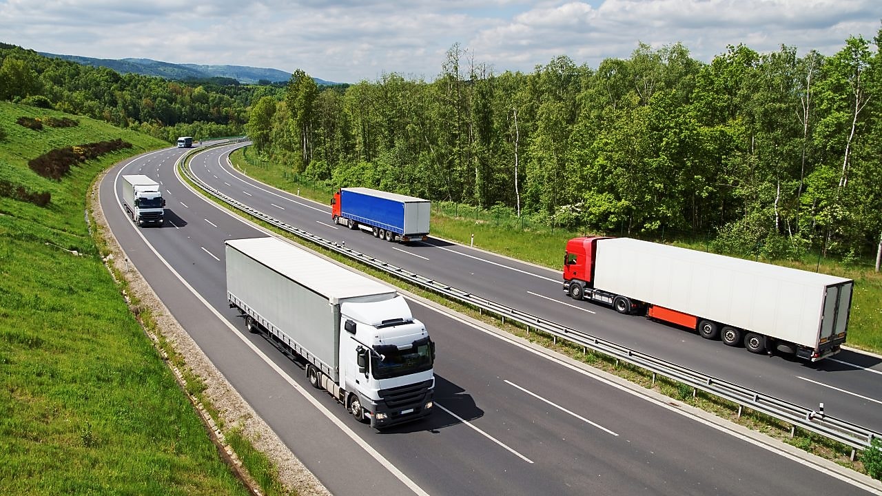 busy highway with the sun setting