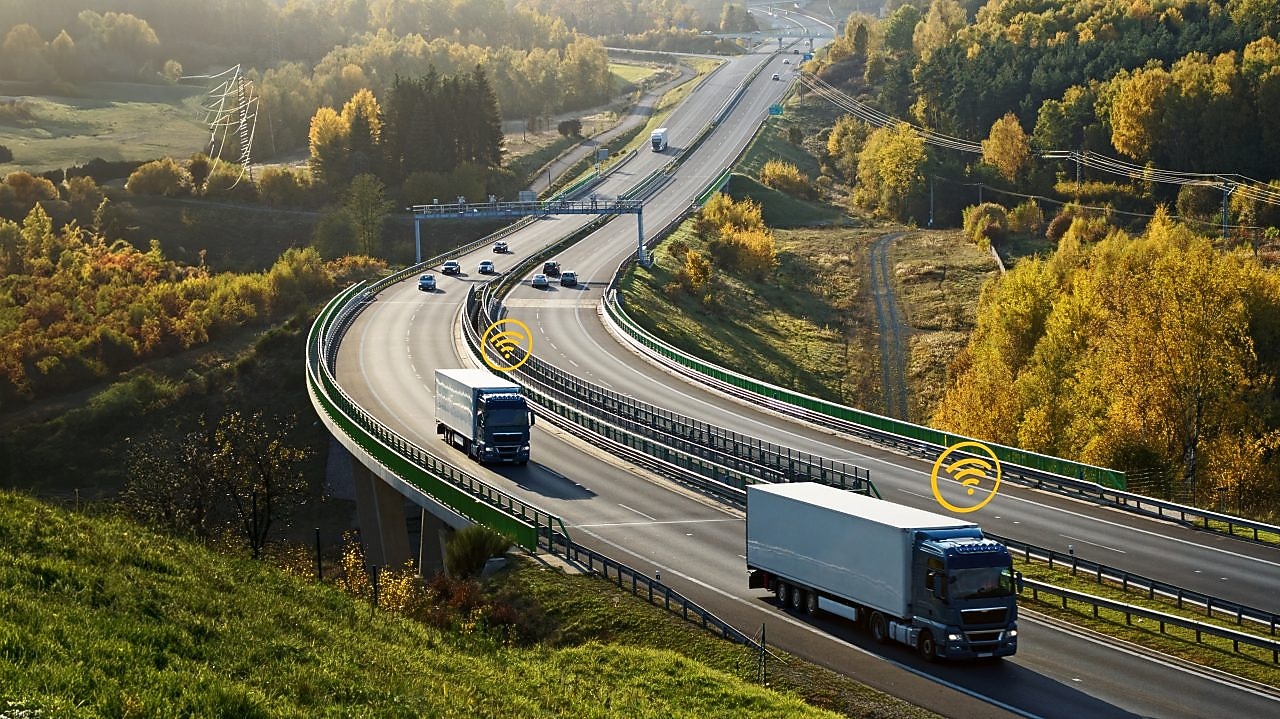 Birdseye view of white truck on highway