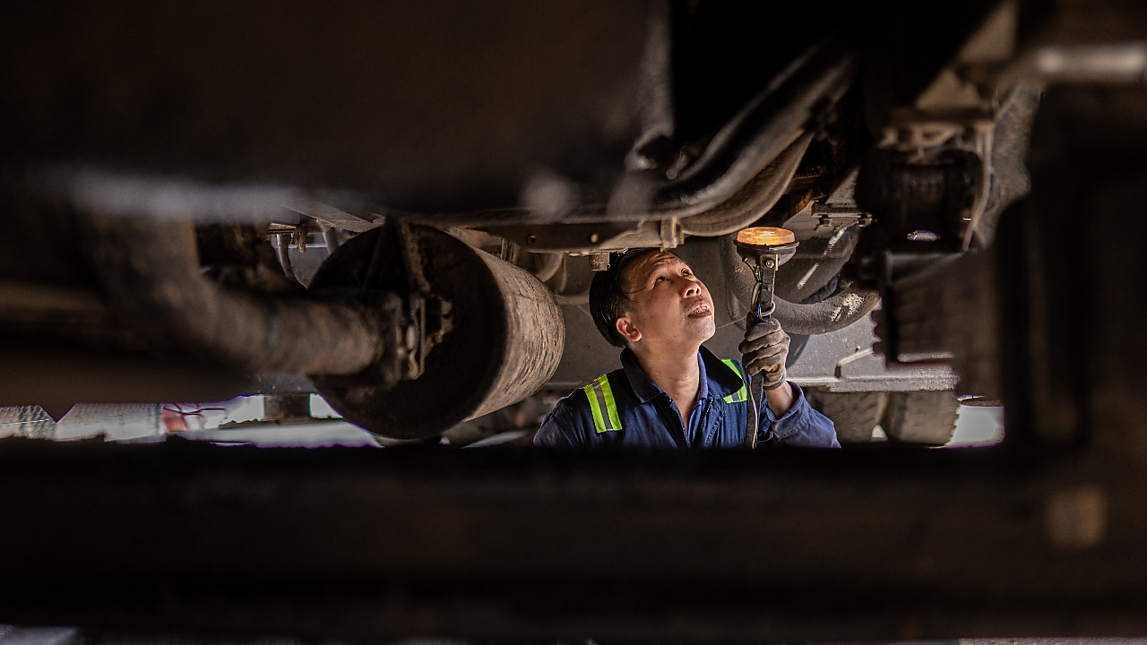 Two mining trucks driving