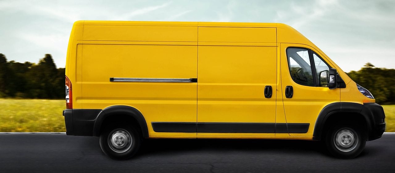 Yellow van on the road