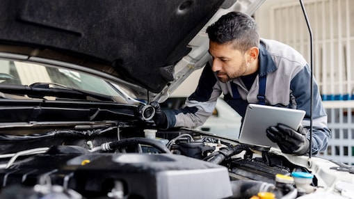 Mechanic Checking Vehicle