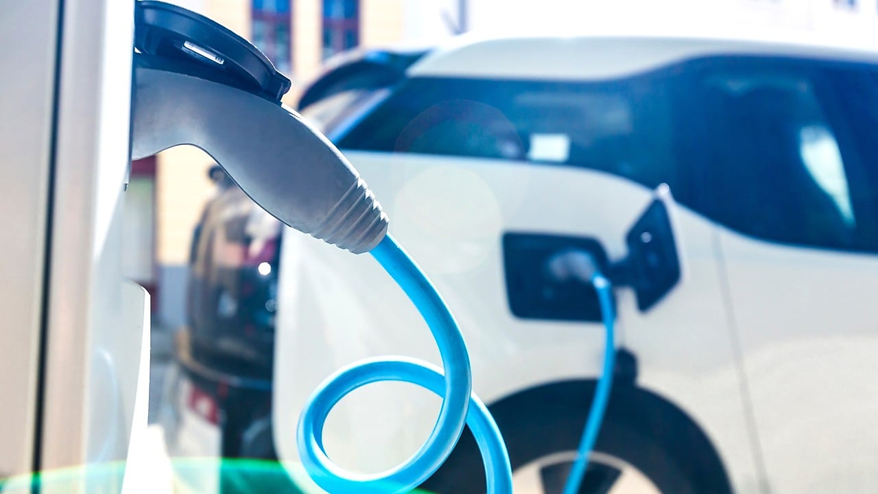 Electric car at charging station