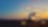 White transit van driving forwards during sunset