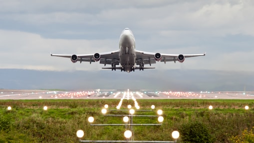 A large plane taking off from a runway