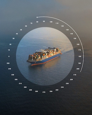 Ocean with shipping container visible through a compass overlay.