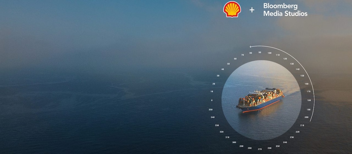 Ocean with shipping container visible through a compass overlay