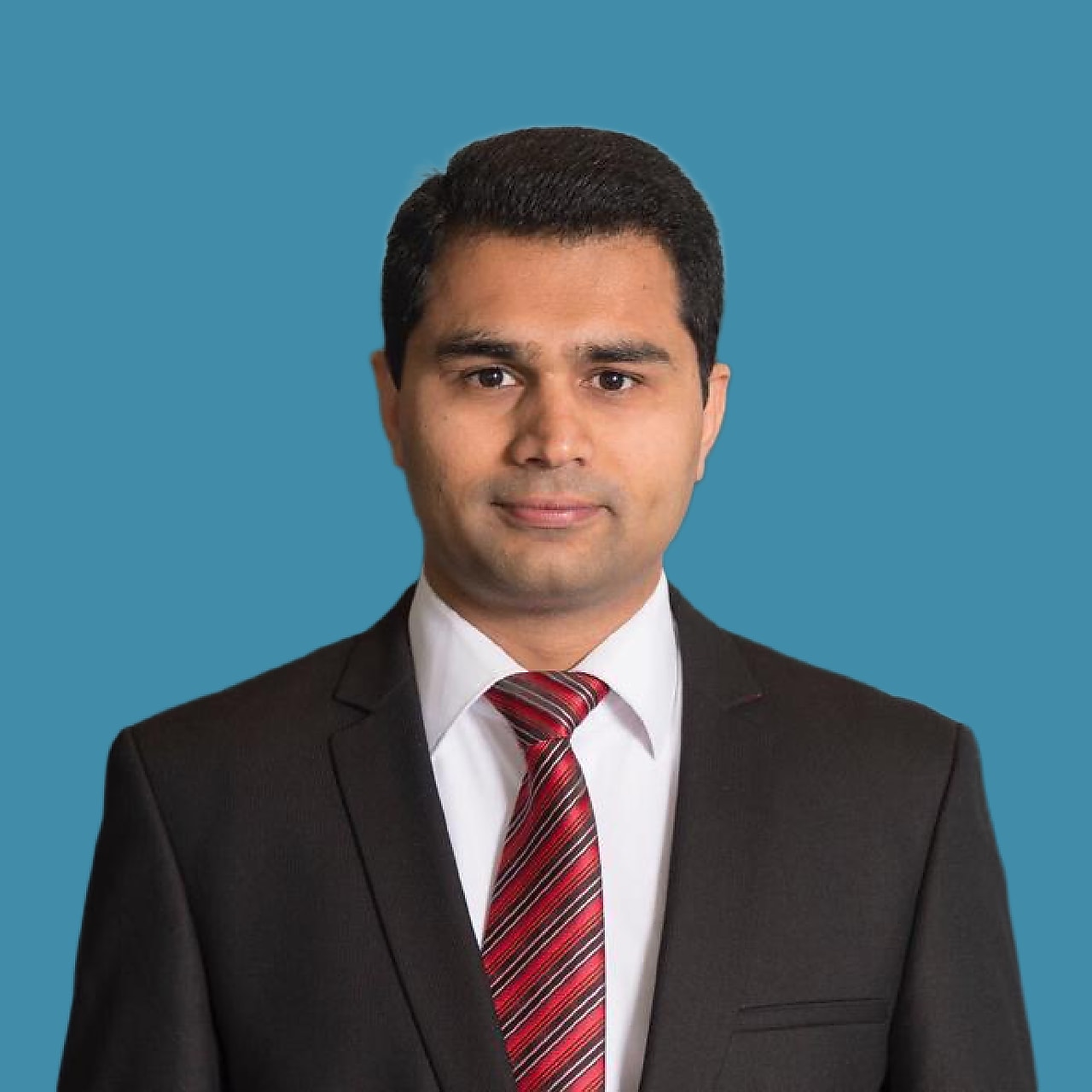 Raman Ojha, President of Shell Aviation, pictured in a professional setting.