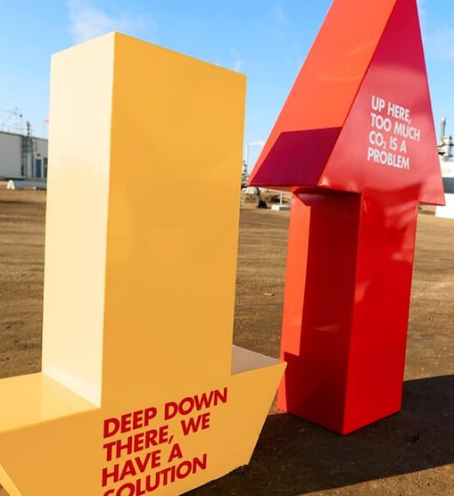 Quest CCS facility with red and yellow up and down installation structure.