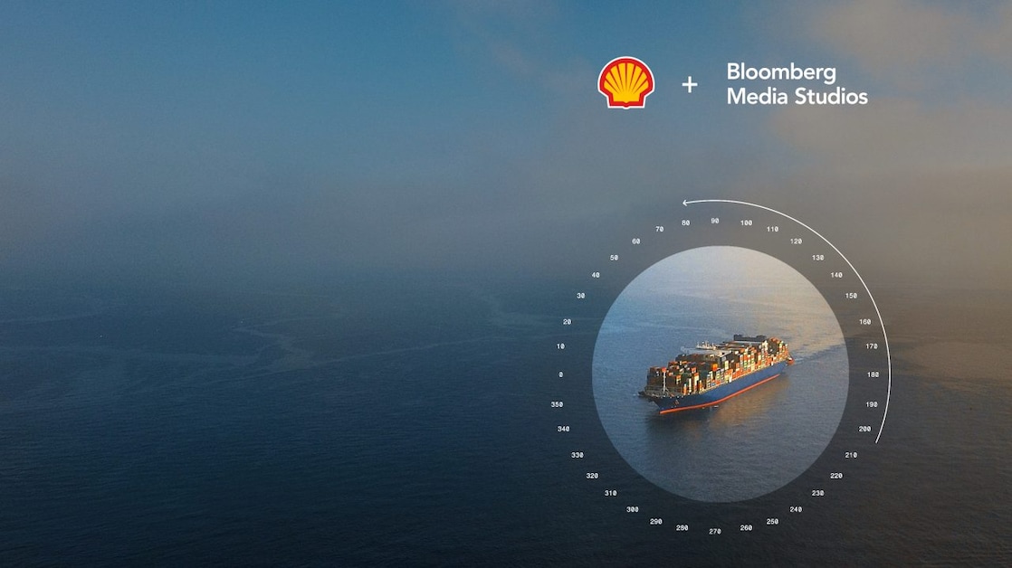 Ocean with shipping container visible through a compass overlay