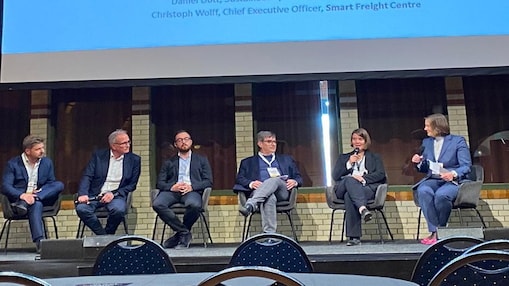 Speaking on stage during a panel discussion at the Sustainable Aviation Futures Congress.