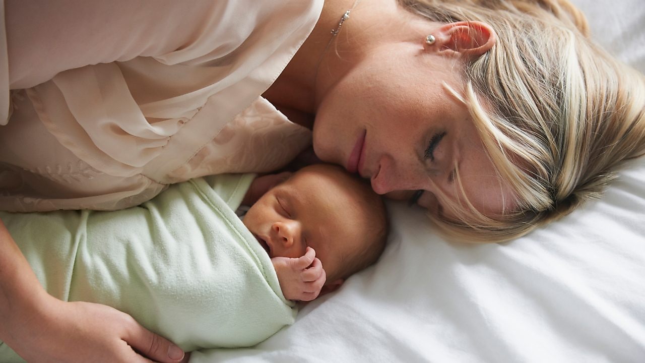 Mum and baby sleeping
