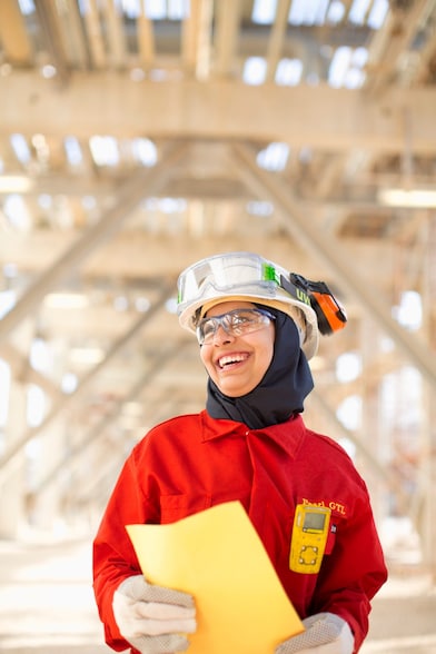 Lady in red dress at work place