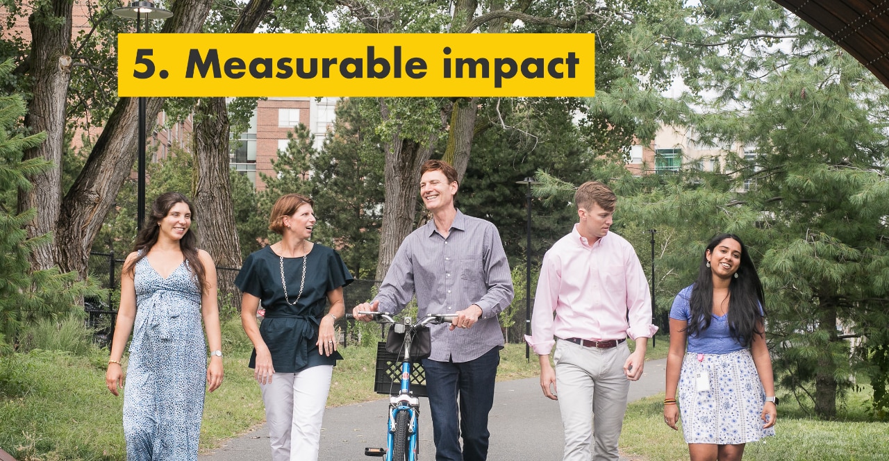 Reason number five – measurable impact. Julie Ferland and Shell TechWorks team taking a walk outdoors.
