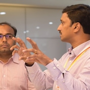 satya-explaining-to-others