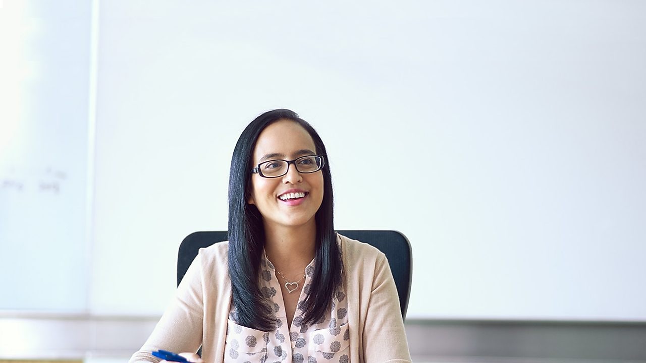 Fazilah at her desk