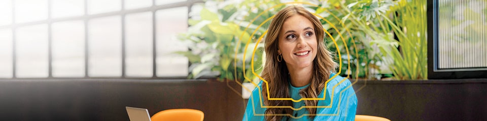 A female Shell Graduate employee in her element as she works on her laptop