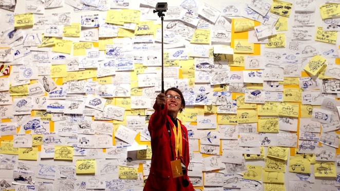 Visitors post 'ideas' on an interactive wall at the 'Experience' during day four of the Shell Eco-marathon in Manila, Philippines, Sunday, March 1, 2015.