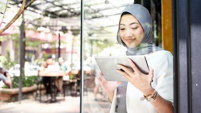 Business woman working on tablet