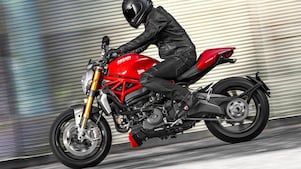 Man driving a Ducati motorcycle