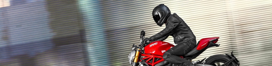 Man riding a bike which is using the Superior Engine Oil For Bikes
