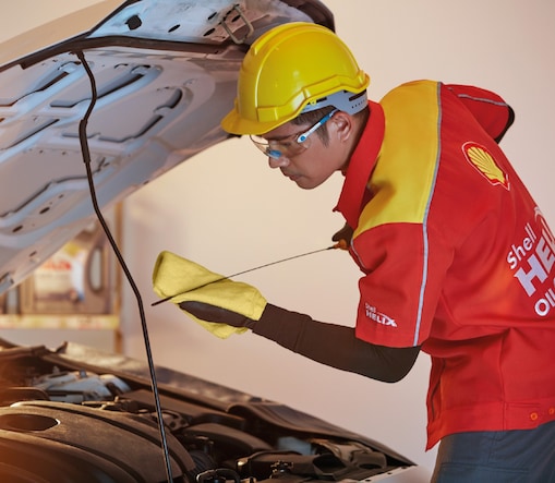 Engineer repairing a car