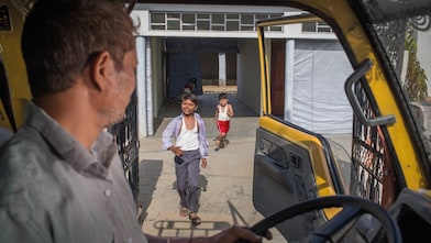 Indian children and truck driver